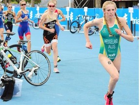 Athletes compete in the World Triathlon Series Grand Final junior women’s race at Hawrelak Park on Friday, Aug. 29, 2014.