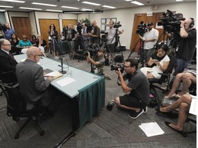 Auditor General Merwan Saher speaks to media about his report on former Premier Alison Redford’s flight and travel expenses in his office in Edmonton on Aug. 7, 2014.