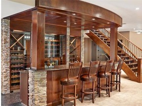 The basement bar in a MacTaggart home designed by Eve Rose