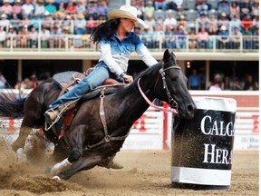 Britany Diaz from Solen, N.D., competes in barrel racing on Day 1 of the 2014 Calgary Stampede rodeo on July 4, 2014.