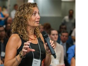 Panelists Joel Wegner, Meghan Dear and Deepak Gupta share their experiences in turning an idea into a business at the Capital Ideas panel on July 16, 2014.