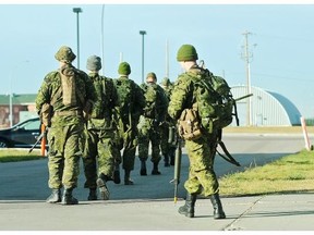 It’s business as usual at the Edmonton Garrison base as troops continue their training after the shooting in Ottawa, in Edmonton, Oct. 22, 2014.