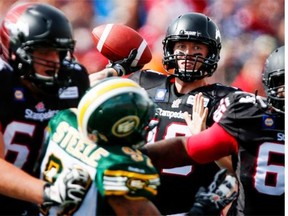Calgary Stampeders quarterback Bo Levi Mitchell throws the ball during CFL football action against the Edmonton Eskimos in Calgary on Sept. 1, 2014.