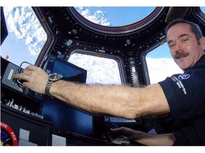Canadian astronaut Chris Hadfield poses for a photo in this undated handout photo.