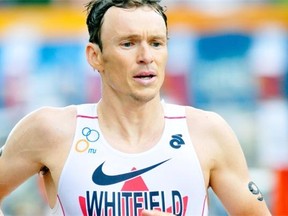 Canadian Simon Whitfield on the running course during the Elite Mens ITU Edmonton World Cup Triathlon at Hawrelak Park on July 10, 2011.