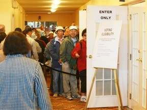 Three years ago, some voters for the Progressive Conservative leadership attended this advance poll at Edmonton’s Ramada Inn. This time around, the party has opted for electronic voting, and Graham Thomson writes that glitches aren’t the only problem the PCs face: Voter apathy could be the real buzz kill.
