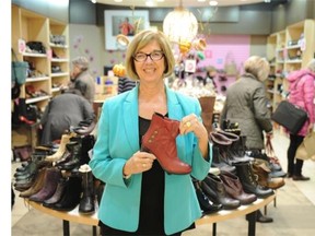 Carol Lord Noland at the Lord’s Shoes store in Southgate Mall that she is closing down Dec. 31.