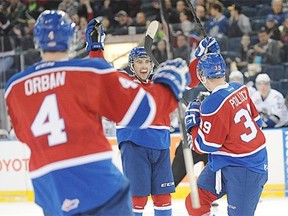 Ben Carroll  of the Edmonton Oil Kings, celebrates the second goal of the first period by Brett Pollock against  the Victoria Royals at Rexall Place in Edmonton on Wednesday, Oct. 15, 2014.