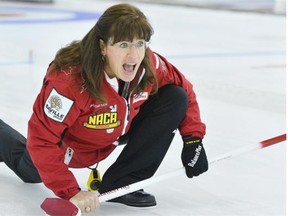 Cathy King yells instructions to her sweepers during the 2013 Alberta senior women’s curling final against Deb Santos at the Granite Curling Club on Feb. 17, 2013.