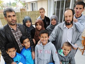 The children of Fauzi Sheta, left, and Mohamed Sliel have not been allowed to return to public school in Edmonton because the company both men work for in Libya was destroyed by bombing and hasn’t paid the international student fees.
