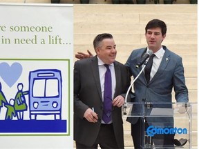 Coun. Dave Loken (l) and Mayor Don Iveson at the launch of the 19th annual Donate-a-Ride campaign. Donate-a-Ride is a community-based charitable initiative that purchases transit tickets which are distributed to local social service agencies.