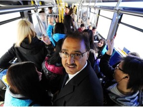 Councillor Amerjeet Sohi rides the bus from the Millwoods Transit Centre. Sohi worries that a high frequency bus strategy could starve the neighbourhood routes in the surburbs.