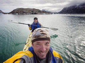 Dalene and Pete Heck, pictured here in Greenland, have traveled for the past five years. The Alberta couple is one of ten travelers of the year in the November 2014 National Geographic Traveler.
