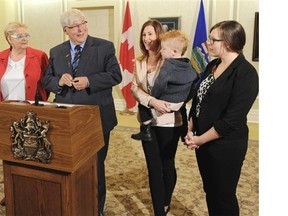 Dave Hancock announces he is resigning his seat as MLA of Edmonton-Whitemud and leaving politics on Sept. 12, 2014. Hancock is surrounded by his wife Janet, daughters Janis and Janine and grandson Kai.