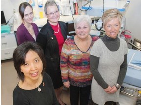 Dr. Dina Kao, left, is heading up some innovative work at the University of Alberta’s Faculty of Medicine & Dentistry and the University of Alberta Hospital that is giving hope to patients suffering from recurring clostridium difficile infection. She is shown with nurse Brandi Roach, patient Alexandra Hildebrandt, Susan Brother and Lora Rode.