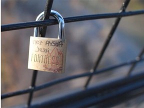 One of the dozens of love locks on the High Level Bridge in Edmonton on October 20, 2014. The city of Edmonton wants to remove the love locks from the bridge. Locksmith Martin Badke wants to make a sculpture for the locks to go on so their romantic symbolism is not lost.