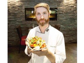 Michael Hassall, head chef at Vivo restaurant with his signature dish, the Caprese salad on October 15, 2014 in Edmonton