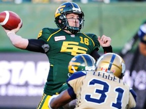 Edmonton Eskimos quarterback Matt Nichols throws a pass against the Winnipeg Blue Bombers during CFL football action at Commonwealth Stadium in Edmonton on Oct. 13, 2014.