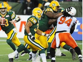 Edmonton Eskimos quarterback Mike Reilly rolls out of the pocket in a Canadian Football League game against the B.C. Lions on Nov. 1, 2014, at Commonwealth Stadium.