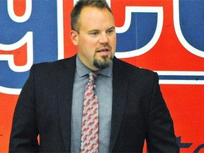 Edmonton Oil Kings new head coach Steve Hamilton on the bench against the Swift Current Broncos during pre-season action at Servus Place in St. Albert, August 30, 2014.