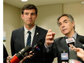 Edmonton Mayor Don Iveson (left) and Alberta premier-designate Jim Prentice emerge from the mayor’s office after a meeting at Edmonton City Hall on Sept. 9, 2014.