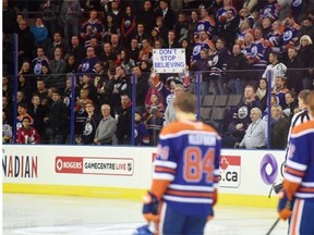 A fan of the Edmonton Oilers, brought a blinking sign to the game against  the Arizona Coyotes at Rexall Place in Edmonton.