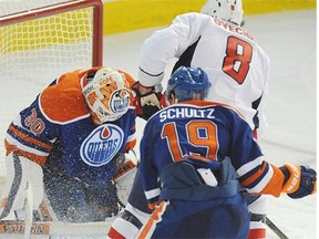 Edmonton Oilers goaltender Ben Scrivens makes a crucial save on Washington Capitals star winger Alex Ovechkin during Wednesday’s National Hockey League game at Rexall Place.