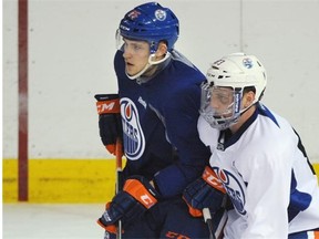 Edmonton Oilers #55 Leon Draisaitl (L) and #83 Connor Boland at the first day of on-ice training camp at Rexall Place in Edmonton, September 19, 2014.