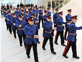 Edmonton Police Service recruits march at the end of their graduation ceremony at City Hall on October 24, 2014.