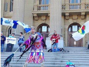 Jamie Medicine Crane of the group, Young Medicine, performs at the Edmonton Sisters in Spirit Rally on Oct. 4, 2014.