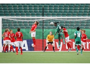 England’s keeper Elizabeth Durack tries to keep an eye on everything going on in front of her net during England’s game with Nigeria on aUG. 13, 2014 in Commonwealth Stadium at the FIFA U-20 Women’s World Cup of Soccer. England was sent home after Nigeria won the game 2-1.