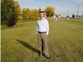 Erik Backstrom, senior planner of Edmonton’s transit oriented development planning unit is pictured at an empty creek bed in Wagner Park. The city is considering plans to re-awaken this creek in connection with development around the future LRT line.