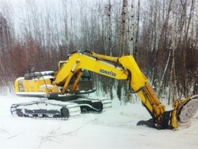 An evidence photo shows the mulcher (wood chipper) equipment near Wandering River that Trevor Bobocel used to try to dispose of his wife’s body in March 2011.