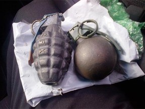 File photo. Dummy hand grenades are shown in a Sarnia police handout photo. A live grenade was found in a box of dishes dropped off at a north Edmonton Goodwill donation centre Saturday afternoon.