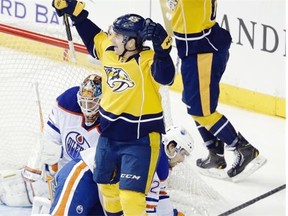 Filip Forsberg celebrates after scoring the Nashville Predators’ third goal in the first period against Edmonton Oilers goalie Viktor Fasth on Tuesday at Bridgestone Arena in Nashville.