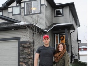 From left, Ian Osborne and Kailey Hilchie in front of their two-storey duplex in Leduc’s Robinson neighbourhood