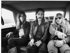 Geddy Lee, left, Neil Peart and Alex Lifeson of Rush circa 1977 in a still from the film Rush: Beyond The Lighted Stage. A Journal reviewer panned the future Hall of Famers’ first concert in Edmonton.