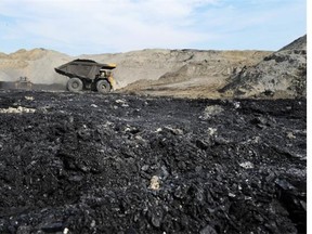 A giant haul truck moving coal over the coal bed at the Genesee mine operation.