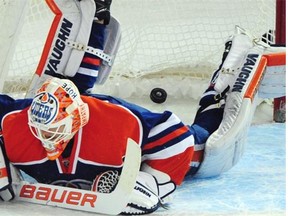 Goalie Ben Scrivens lets in the third goal during the Edmonton Oilers’ 4-3 OT loss to the Ottawa Senators at Rexall place in Edmonton on Wednesday, Nov. 13, 2014.