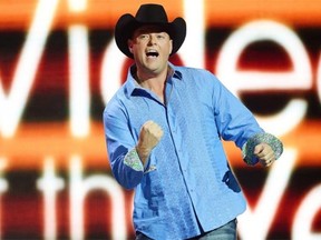 Gord Bamford celebrates after winning the CMT Video of the Year award at the Canadian Country Music Association Awards held at Rexall Place in Edmonton on Sept. 8, 2013.