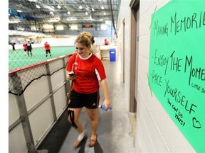 A group of soccer players are encouraged by a sign during a 48-hour soccer game organized to raise funds for cancer research and break the Guinness World Record of 31 hours. The players met their goal for the World’s Longest Soccer game, playing from noon on Oct. 10 to noon on Oct. 12 at Millennium Place in Sherwood Park.