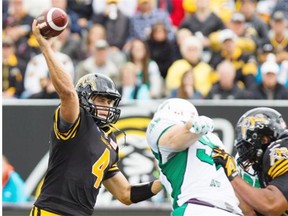 Hamilton Tiger-Cats quarterback Zach Collaros throws a pass against the Saskatchewan Roughriders during a Canadian Football League game at Tim Hortons Field in Hamilton on Sept. 14, 2014.