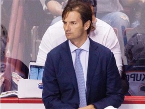 Head coach Dallas Eakins of the Edmonton Oilers is watches his team face the Vancouver Canucks at Rogers Arena on October 5, 2013 in Vancouver.