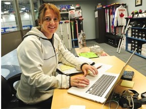 Heather Nedohin at work in her office at the Sherwood Park Curling Club in the Glen Allen Recreation Complex in Sherwood Park, Oct. 1, 2014.