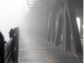 The High Level Bridge on a foggy morning. The city is investigating measures to reduce the number of people who jump to their deaths from the century-old bridge.