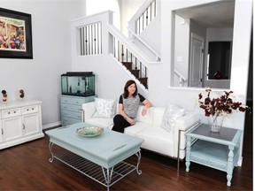 Janice Moore loves the living room in her new home, put together with the help of painter and designer, Karen Woitas of Annie’s Repurpose Shop.