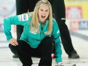 Jennifer Jones, the 2014 Olympic gold-medallist, calls for sweeping on her rock during a Canada Cup game at Encana Arena in Camrose on Wednesday, Dec. 3, 2014.