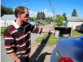 Jeremy Christensen heard a woman’s screams in his back alley north of downtown Sunday morning, as she and her small dog were being attacked by numerous dogs. Christensen got an axe and tried to scare the dogs away, at one point having to stand on the roof of his car to avoid being attacked himself.