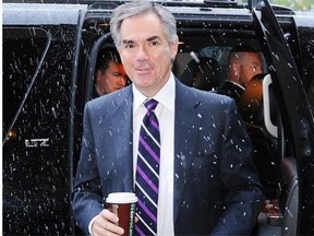 Premier-designate Jim Prentice enters Government House for a meeting with Premier Dave Hancock on Monday.