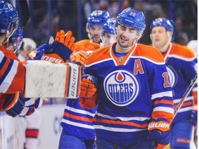 Jordan Eberle #14 of the Edmonton Oilers celebrates his 100th NHL goal during a game against the Ottawa Senators at Rexall Place on November 13, 2014 in Edmonton.